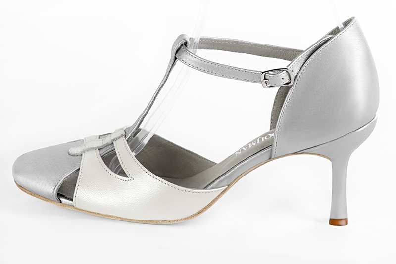 Light silver and pure white women's T-strap open side shoes. Round toe. High slim heel. Profile view - Florence KOOIJMAN
